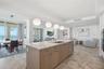 Kitchen island with seating and abundant prep space.