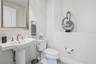 Convenient powder bath off the main living area.