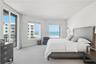 Oversized primary bedroom suite with community, beach and water views!