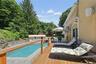 Wrap around deck with coffee table and lounges