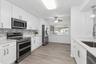 Designed with today's lifestyle in mind, the fully remodeled kitchen features modern finishes, ample storage, and an inviting space for gathering with
