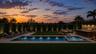 This image has been virtually staged to showcase the backyard and pool area's potential.