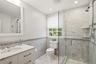En-suite bath with marble vanity
