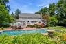 Beautiful Perennial gardens frame the pool