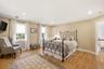 Third bedroom with an en suite bath and large closet.