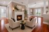 Primary bedroom sitting area virtual staged