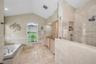 Primary bathroom w/separate soaking tub and shower