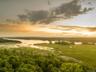 Aerial view at dusk with a water view