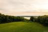 View of yard featuring a water and mountain view