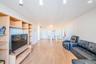 Living area with light wood-style floors