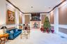 Common area with recessed lighting and crown molding