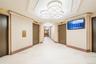 Hallway featuring elevator