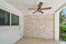 Convenient covered patio with pass through kitchen window
