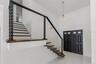 Vaulted ceiling create a grand entrance