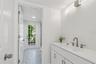 Ensuite bathroom with separate toilet and shower leading outside