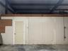 Door to bathroom with second door into office. Office also has another entry door across from loft
