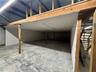 Possible second office under loft (needs doors and paint)