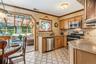 Enter from the dining room into the eat-in-kitchen.