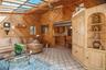 The warm wood finishes add character & charm to this great room.