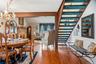 Off the dining room and living room are the stairs to the lofted family room, 4th bedroom and 3rd bathroom.