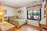The adjoining 2nd bedroom also provides a large window and standard closet.
