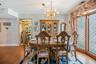 The formal dining room flows off of the living room.