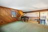 This level of the home has endless possibilities.  It can be used for quiet entertaining, a reading retreat or a guest quarters.