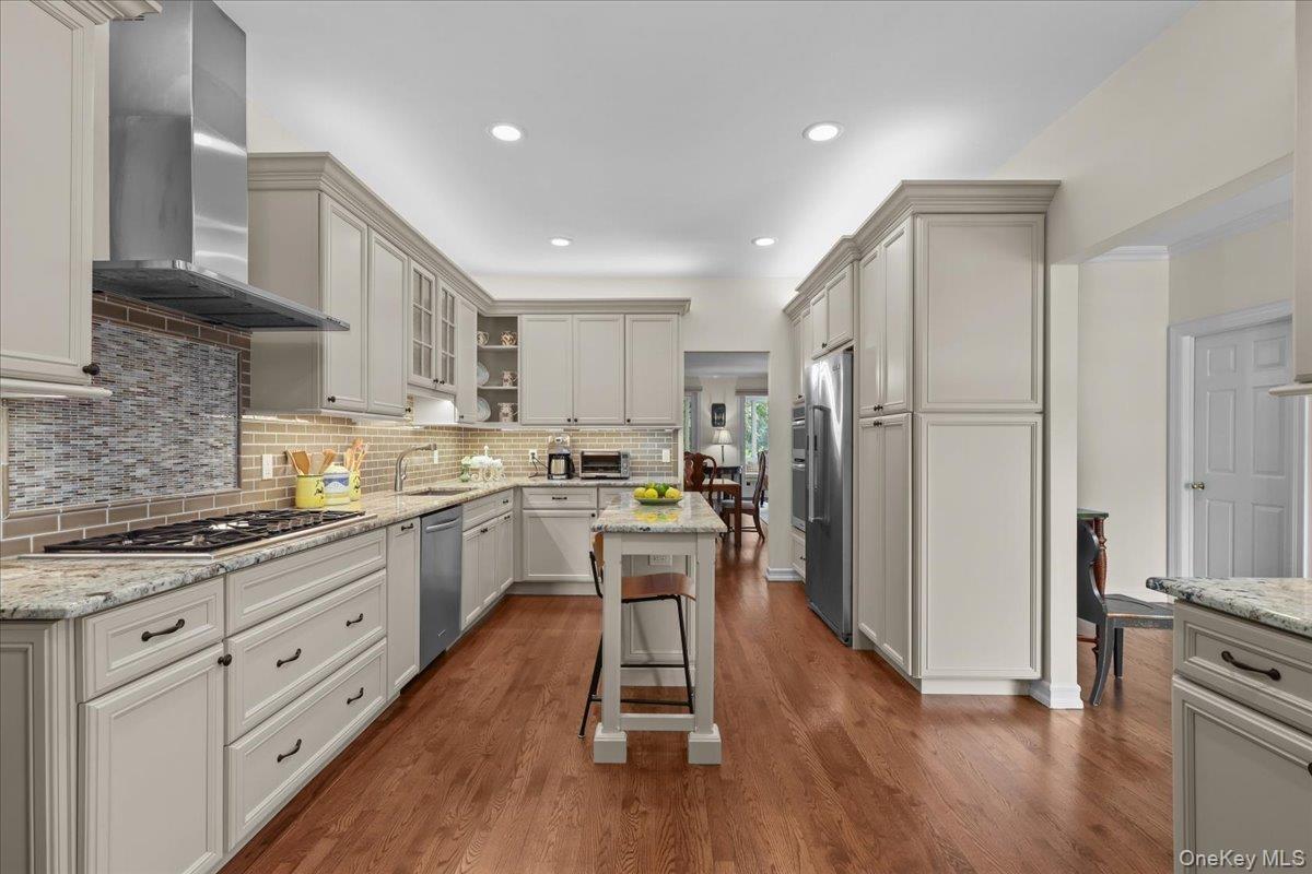 Another view of kitchen with breakfast bar
