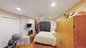 Interior room featuring wood-finish flooring, recessed lighting, and a ceiling fan