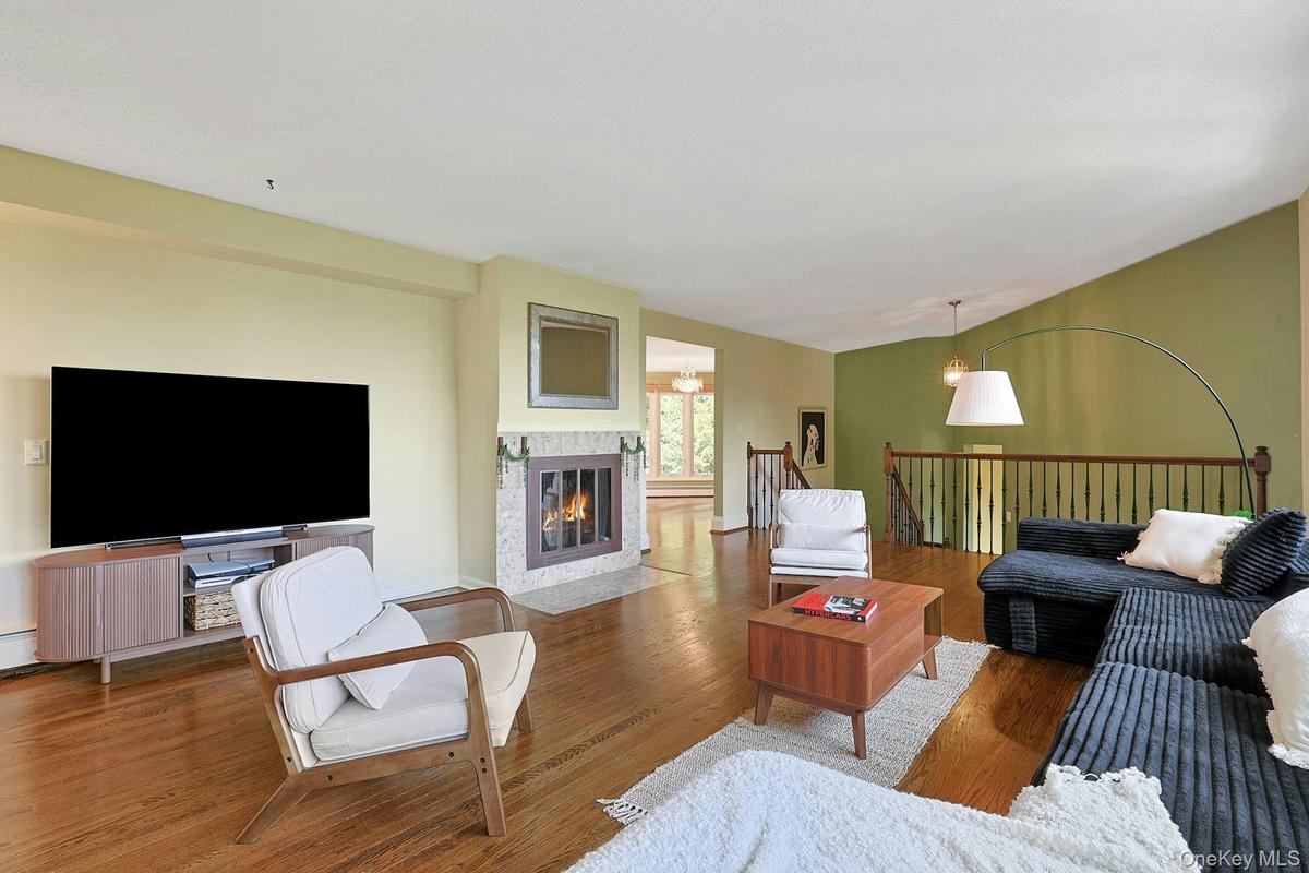 While the view is the biggest star here, the wood-burning fireplace that centers the room is no slouch.