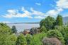 A closer look at the view from the balcony, out to the river and the hill beyond.