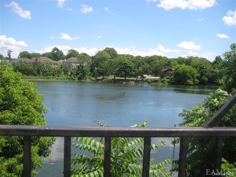 Welcome home to Peace and Tranquility at 248 Pelham Road! Your very own large terrace, featuring a elec-powered awning overlooking Bucolic Mill Pond H