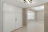 Enter the home through double doors looking into dining room to the left and office/flex room to the right