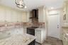Kitchen - corner lighted cabinet for display