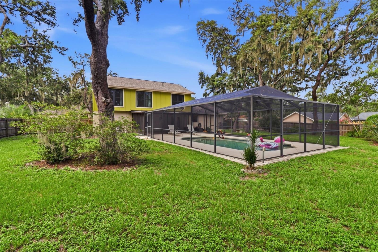 Large corner lot home with pool and LOTS of yard, fully fenced.
