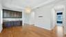 Custom storage with sink and beverage cooler in family room