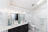 Bathroom featuring a double vanity.