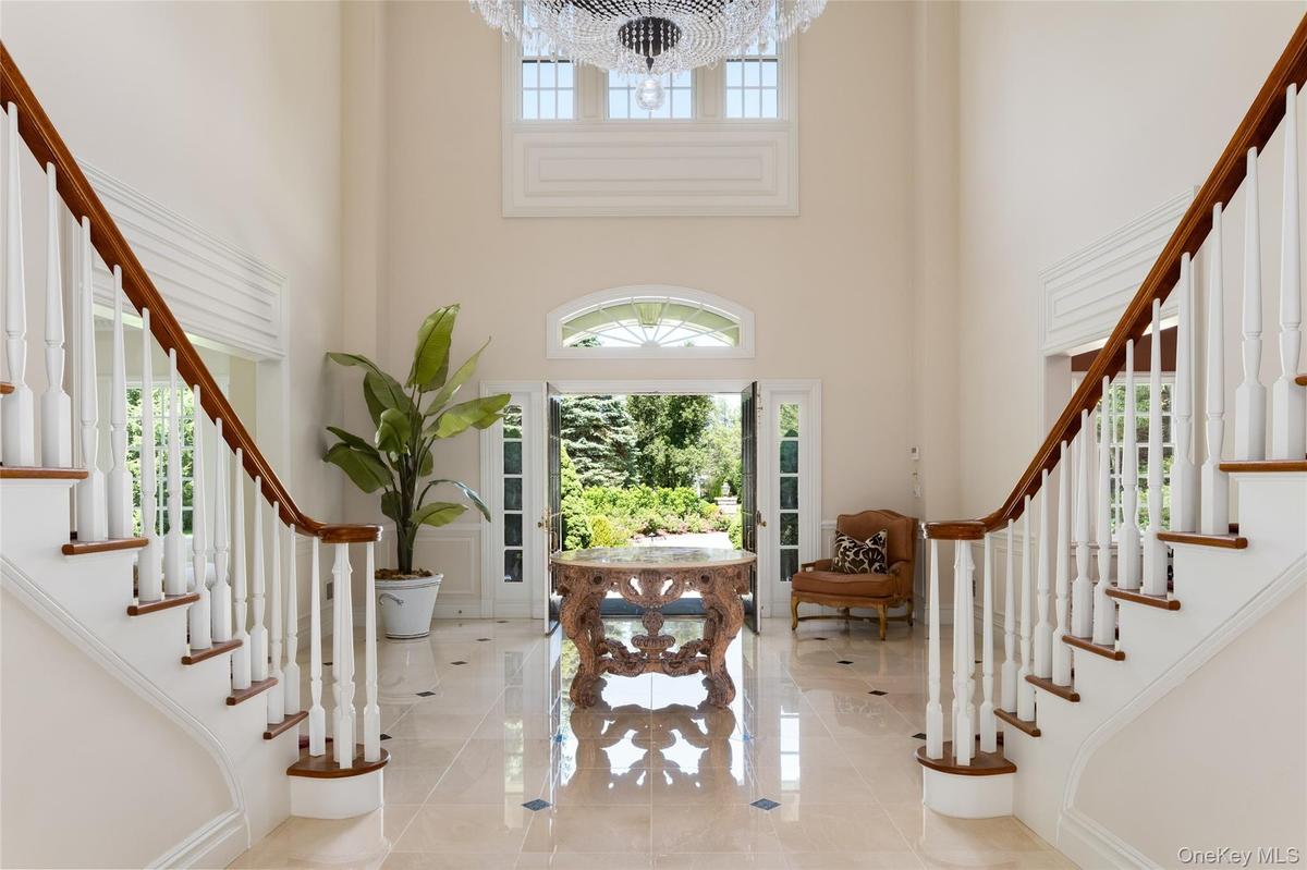 Double Staircase looking out at the private entry