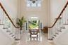 Double Staircase looking out at the private entry