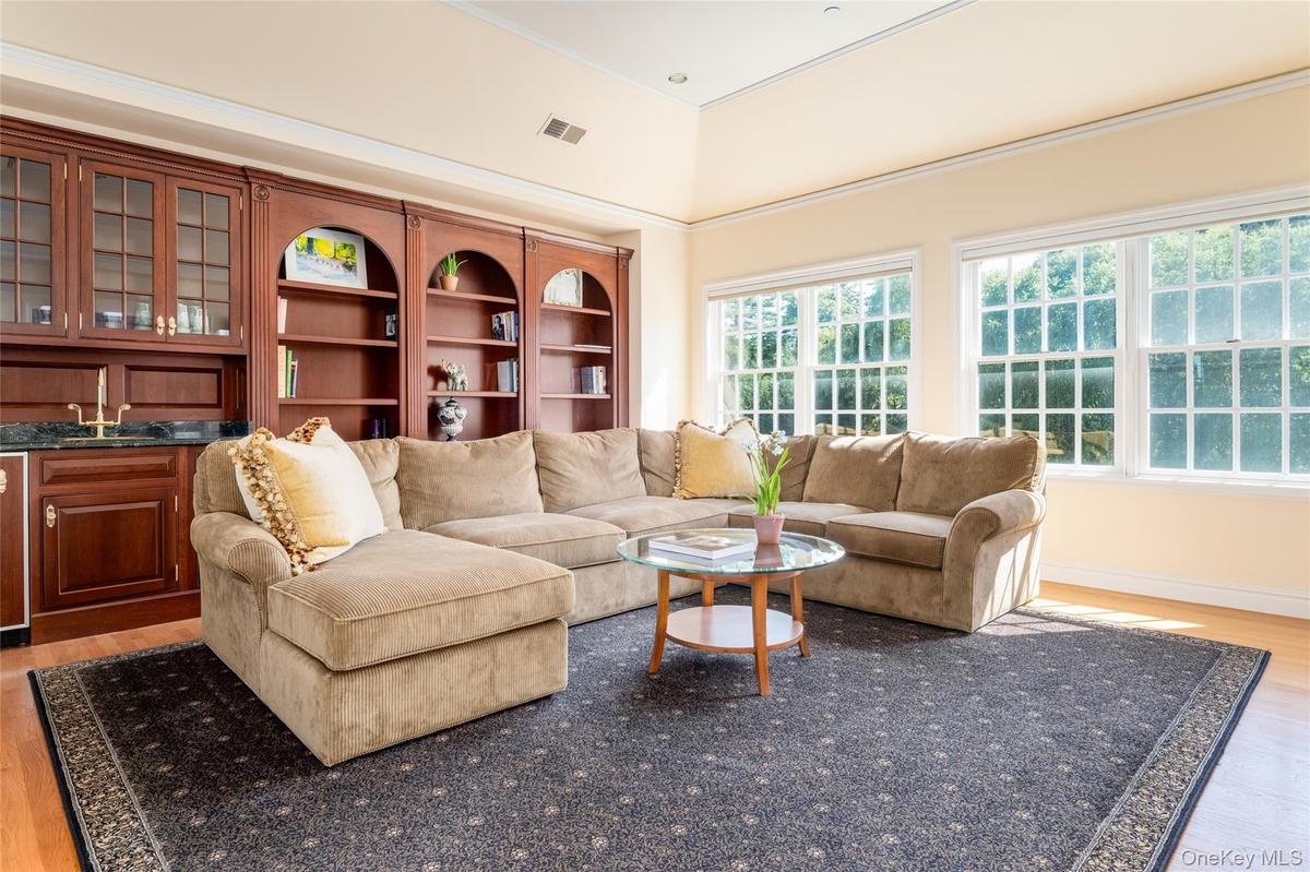 Primary sitting Room with custom builtins and coffee bar