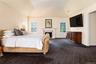 Luxurious Primary Bedroom with fireplace