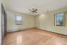 Unfurnished bedroom featuring light wood-style flooring, baseboard heating, recessed lighting, and ceiling fan