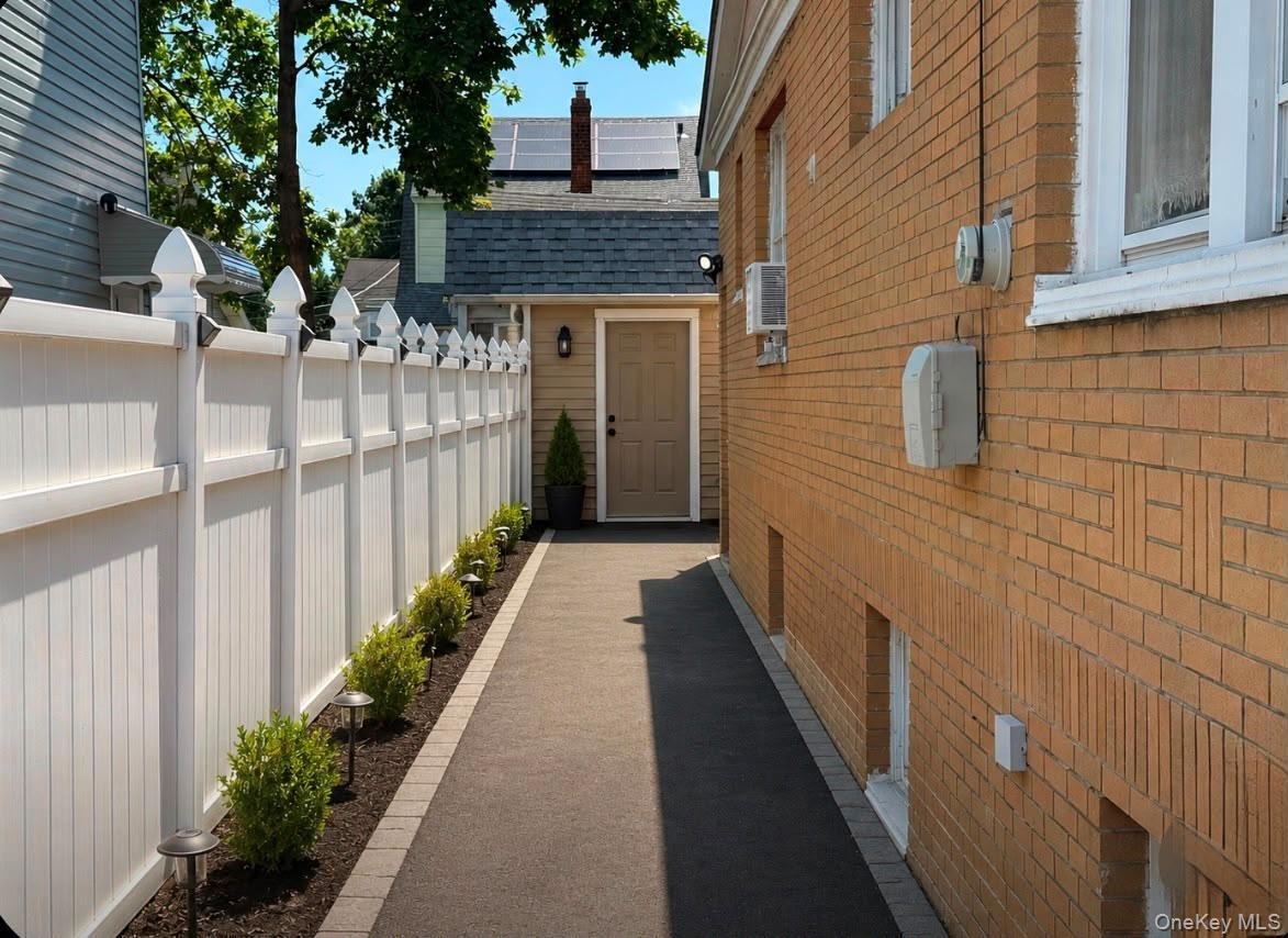 altered version of side of house photo via AI