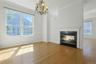Double sided fireplace in Formal Dining Room and Formal Living Room