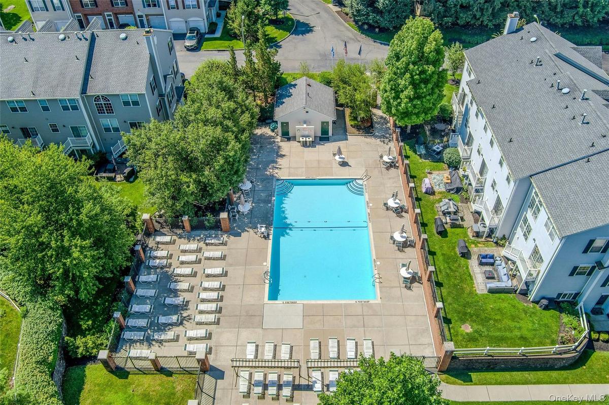 Community pool with lots of seating area, lifeguard. Great for soaking up the sun