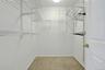 Primary Bedroom walk in closet