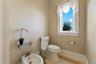 Because every detail matters, the primary suite includes a separate water closet with bidet and natural light.