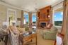 The heart of the home, this inviting living room is a place to gather, relax, and enjoy the views in every direction.