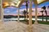 An evening glass of wine, a quiet conversation, or simply watching the colors change across the sky—this covered terrace creates a front-row seat to s