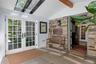 Welcoming foyer with skylights and original stone walls